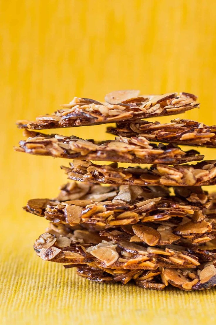 a stack of cookies sitting on top of a yellow table