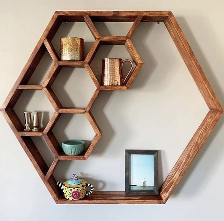 the shelves are made out of hexagonal wood