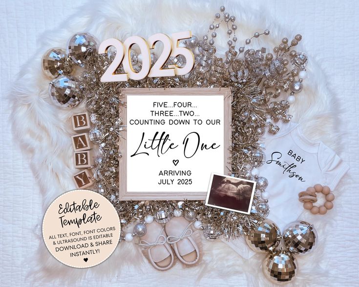 a couple's birth announcement surrounded by baby items and other personalized items on a white blanket