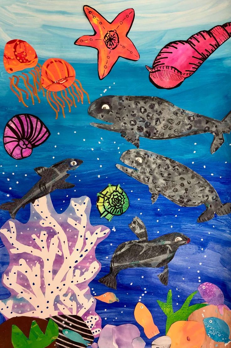 an underwater scene with sea animals and corals painted on the side of a wall