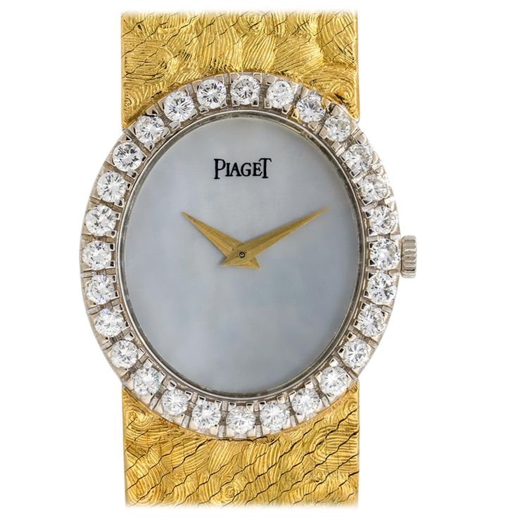 Brand: Piaget Model: 9814 Case Material: 18k Yellow Gold Bezel: Round Diamond bezel Dial: White Mother of Pearl dial with yellow gold hands Bracelet: 18k yellow gold two piece bracelet Crystal: Sapphire Crystal Size: Will fit up to a 6.5" wrist Clasp: 18k white gold buckle Movement: Manual winding Additional Details: This item comes with a Presentation box and 1 Year Warranty SKU: W3357 Hand Bracelet, Gold Hands, Bezel Diamond, Beautiful Watches, Diamond Watch, Sapphire Crystal, Round Diamond, Accessories Watches, Mother Of Pearl