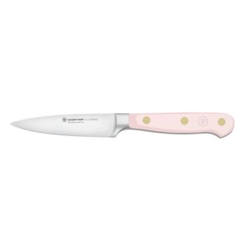 a pink and white knife with gold dots on the blade, against a white background