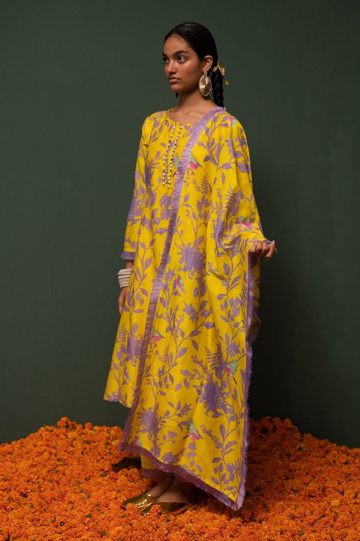 Yellow chanderi silk kurta with floral and bird print. Paired with cotton pant and dupatta.
Component: 3
Pattern: Printed
Type Of Work: Floral, bird
Neckline: Round
Sleeve Type: Three quarter
Fabric: Chanderi silk, cotton
Color: Yellow
Other Details: 
Fringe border
Pearl embroidered placket
Occasion: Sangeet - Aza Fashions Kurta Set For Women, Silk Kurta, Bird Print, Kurta Set, Cotton Pants, Bird Prints, Set For Women, Yellow Floral, Aza Fashion