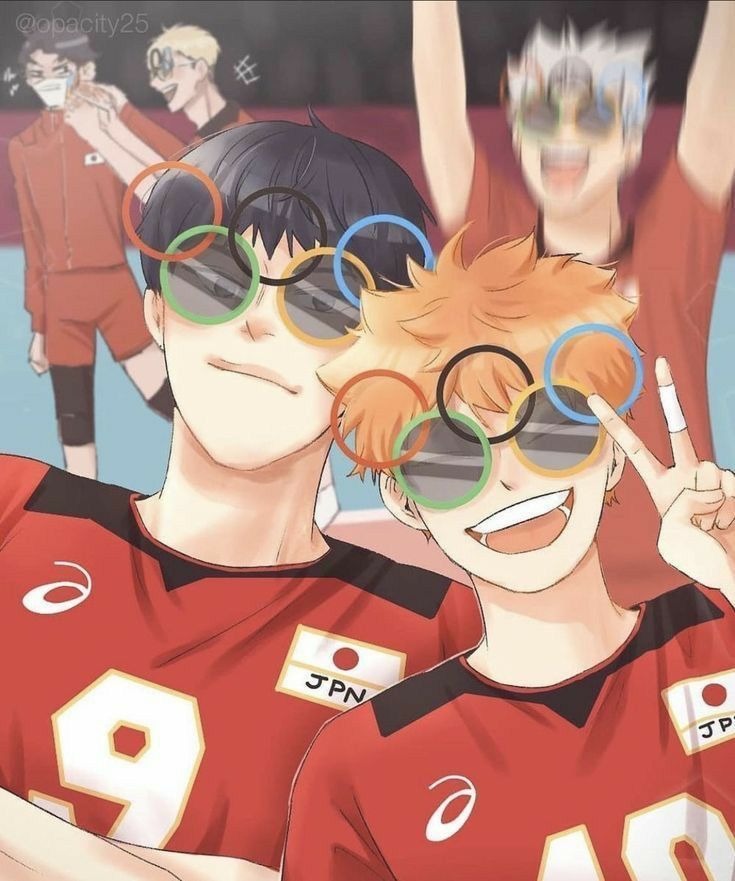 two young men in red jerseys with sunglasses on their faces