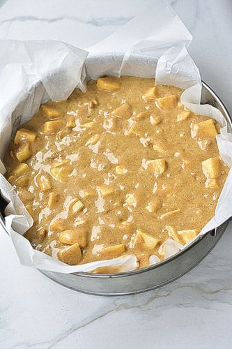 a pan filled with food sitting on top of a counter