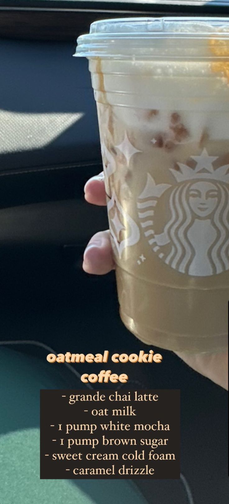 someone holding up a cup of iced coffee in front of a car window with the caption, animal cookie creme chai latte