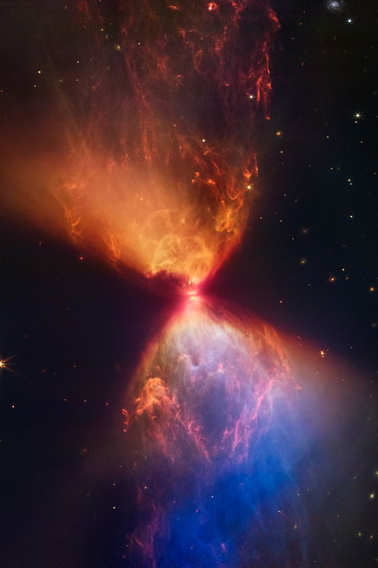 an image of a very large star in the sky with bright colors and stars around it