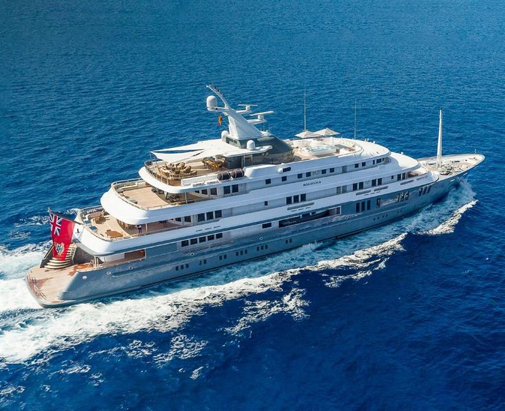 a large white boat in the middle of the ocean