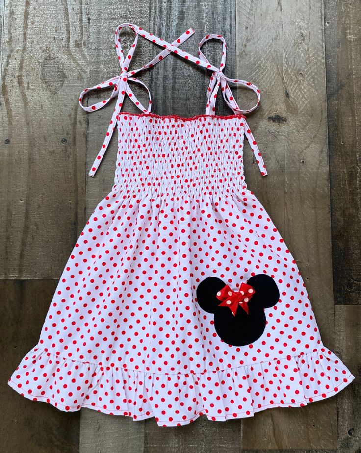 White Red Polka Dot Minnie Mouse Dress Playful Minnie Mouse Summer Dress, Minnie Mouse Fitted Sleeveless Dress, Minnie Mouse Sleeveless Fitted Dress, Red Fitted Minnie Mouse Dress, White Minnie Mouse Summer Dress, Sleeveless Minnie Mouse Dress For Spring, Red Cotton Minnie Mouse Dress, Fitted Cotton Minnie Mouse Dress, Casual Minnie Mouse Summer Dress