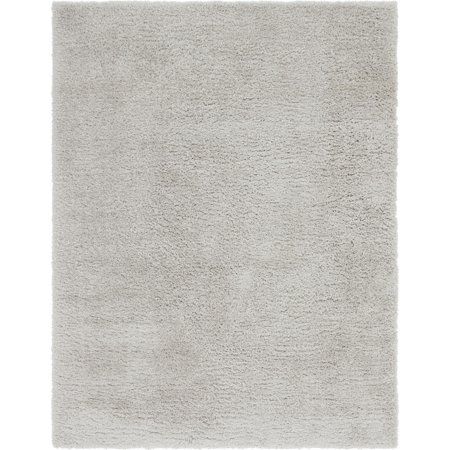 a white rug on a white background