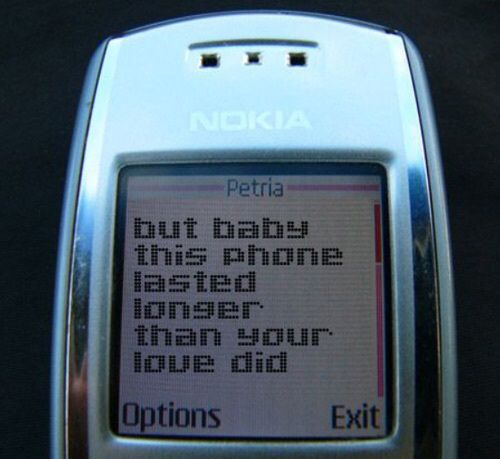 an old cell phone with the message petria on it's screen, but this phone has been longer than your love did