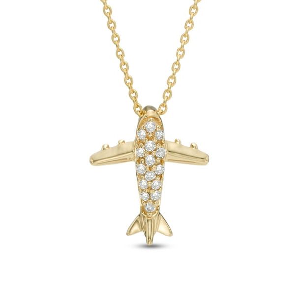 For the world traveler - or the dreamer of far-off lands - this shimmering fashion pendant keeps the next exciting itinerary at hand. Crafted in warm 10K gold, this intricately detailed airplane is dotted with sparkling diamond accents that catch the eye. A brilliant reminder of the adventures yet to come, this pendant is finished with a polished shine and suspends along an 18.0-inch cable chain that secures with a spring-ring clasp. Luxury Silver Jewelry For Travel, Elegant Sterling Silver Necklace For Travel, Yellow Gold Pendant Necklaces For Travel, Luxury Yellow Gold Jewelry For Travel, Yellow Gold Pendant Jewelry For Travel, Airplane Pendant, Fashion Pendant, Sparkling Diamond, Yet To Come