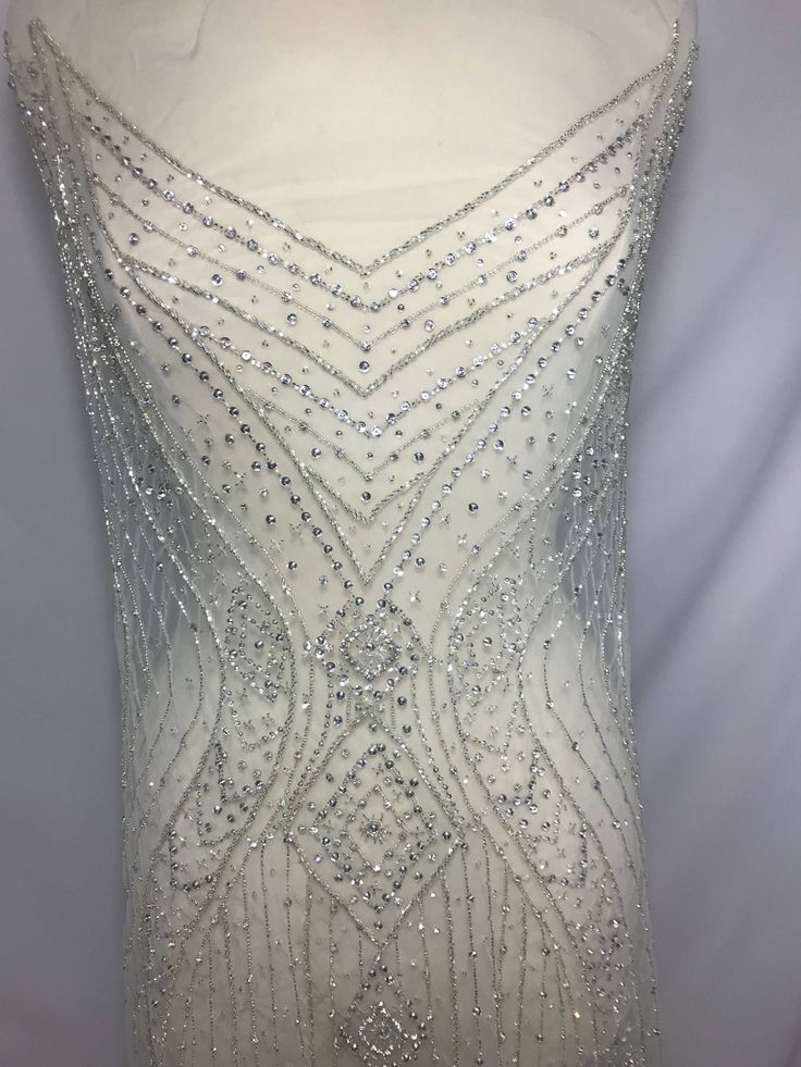 "For more pictures visit www.KatLabel.com Here is a quick video of the full piece: https://youtu.be/U49yUXcLLMM Have you always wanted to be covered in beautiful beading and elegant rhinestones for your special day? Pictures usually say a thousand words but the elegance of this dress panel can not be captured by a simple picture. This stunning sheer rhinestone beaded dress panel is a fairytale dress waiting to compliment your beautiful day. This gorgeous panel is one entire piece and is sold as Rhinestone Fabric, Wedding Applique, Beaded Fabric, Day Pictures, Bridal Applique, Beaded Tulle, Bridal Fabric, Applique Wedding Dress, Wedding Dress Fabrics