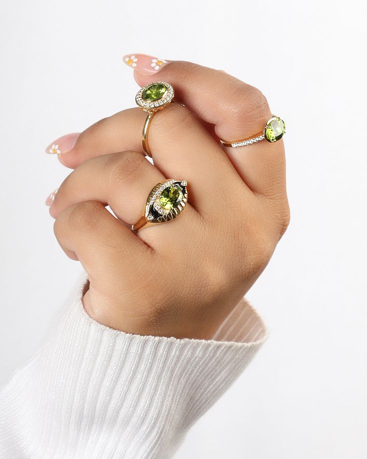 Bold, beautiful, and undeniably boss - packed with a punch of peridot that's as sunny as your disposition, the Dayglow Ring is ready to add a dash of glow to your everyday ensemble. Whether you're conquering the world or simply conquering your coffee, this ring is your go-to glow-up. Slip it on and let the compliments roll in. Your jewelry is designed to last a lifetime, but keep in mind that they are still made from precious metals and delicate stones. While our jewelry pieces can be worn every Green Diamond Stackable Round Ring, Stackable Green Diamond Ring, Green Stackable Round Diamond Ring, Fine Jewelry In Green Peridot, Green Peridot Fine Jewelry, Fine Green Peridot Jewelry, Green Peridot Stackable Jewelry, Green Peridot Stackable Rings, Fine Jewelry Lime Green Diamond