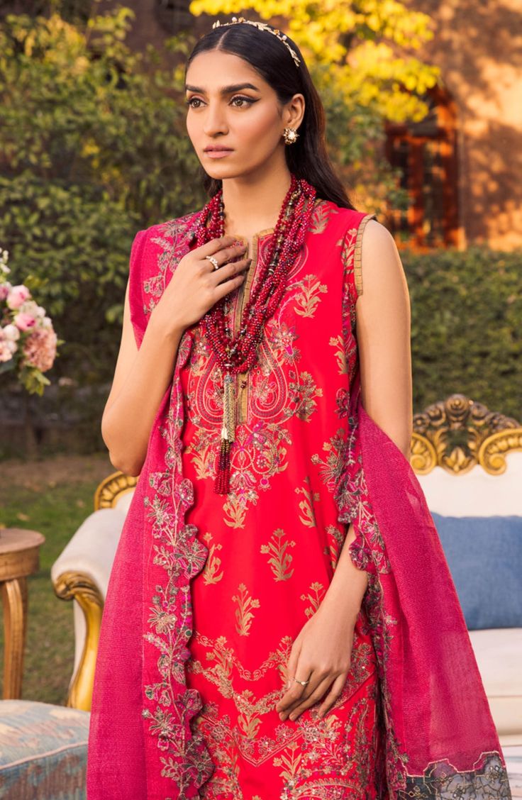 Pakistani Embroidered Suit in Kameez Trouser Style is a beautiful attire to wear on the festive Eid. This beautiful Pakistani Dress is adorned with embroidery, motifs, and lavish designs, making it a chic choice to have a vibrant look on the big day. Detailed Description: SKU: PS1780 Detailing: Embroidery, Threads, Block print Color: Berry Red, Purple Fabric: Lawn, Organza Design: Fully Embroidered dress Event: Festive, Party wear Pakistani Boutique, Embroidered Suit, Readymade Saree, Beautiful Pakistani Dresses, Lawn Dress, Eid Dresses, Net Dupatta, Pakistani Designers, Purple Fabric