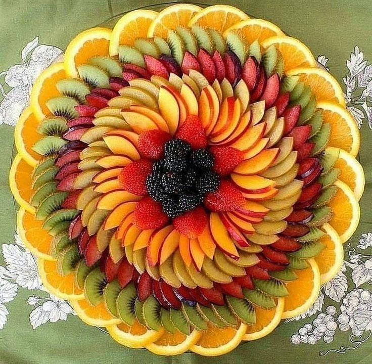 an image of a flower made out of fruit