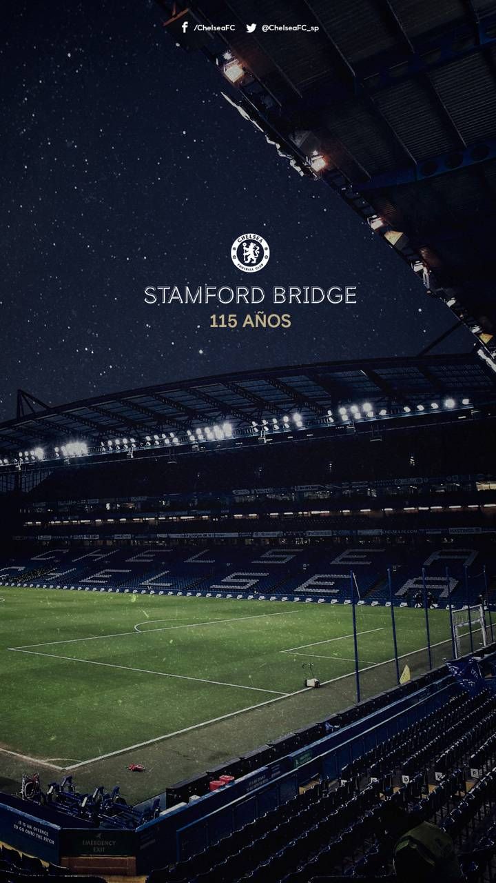 an empty stadium at night with the words stanford bridge on it