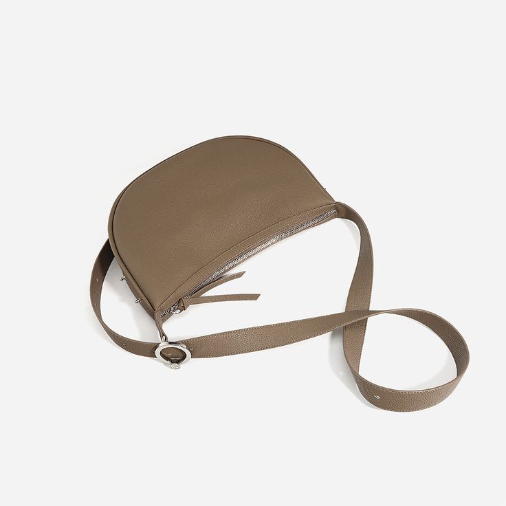 Timeless and On-Trend Hobo A Hobo, it's one style that works for everyone, whatever your lifestyle is. Whether you’re commuting to work or traveling abroad, a hobo bag will carry everything that you need and more. This understated and minimalistic hobo bag may be a good investment for you this time. This Hobo shoulder bag is made from soft, casual top grain leather, features a single adjustable shoulder strap for easy carrying. The simple hobo bag is available in 4 different colors for everyday Modern Hobo Shoulder Bag For On-the-go, Versatile Daily Shoulder Saddle Bag, Versatile Saddle Satchel Bag For Travel, Versatile Large Capacity Baguette Bag For Travel, Versatile Travel Baguette Bag, Versatile Travel Baguette Bag With Large Capacity, Modern Saddle Bag With Zipper For Travel, Commuting Leather Shoulder Bag With Removable Pouch, Commuting Satchel Shoulder Bag With Removable Pouch