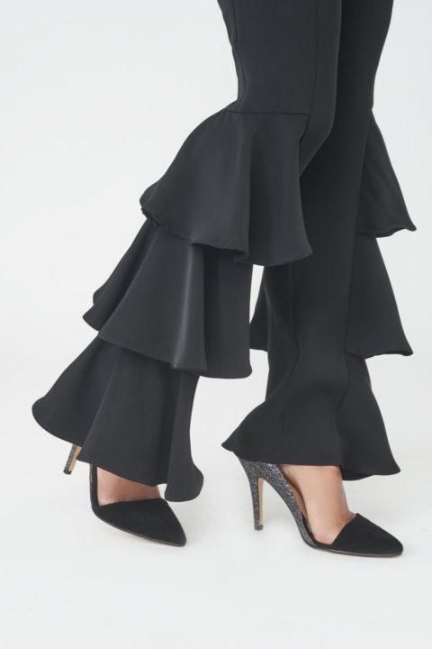 The style of trousers to be sporting this season, these frill side tailored beauties will bring a playful update to your basic work and evening wardrobes. Great for the office with some pointed heels, or straight to meet your girls for a night out with some striking stilettos. We’re calling these an investment item – not to be missed. Frill Side Tailored Trousers Polyester Hand wash Imported Brand: Lavish Alice Glamorous Black Flare Pants, Chic Party Dress Pants For Fall, Chic Fall Dress Pants For Party, Glamorous Stretch Pants For Work, Chic Flare Pants For Party, Chic Ruffled Bottoms For Formal Occasions, Black Flare Dress Pants For Evening, Black Stretch Dress Pants For Party, Elegant Black Ruffled Bottoms