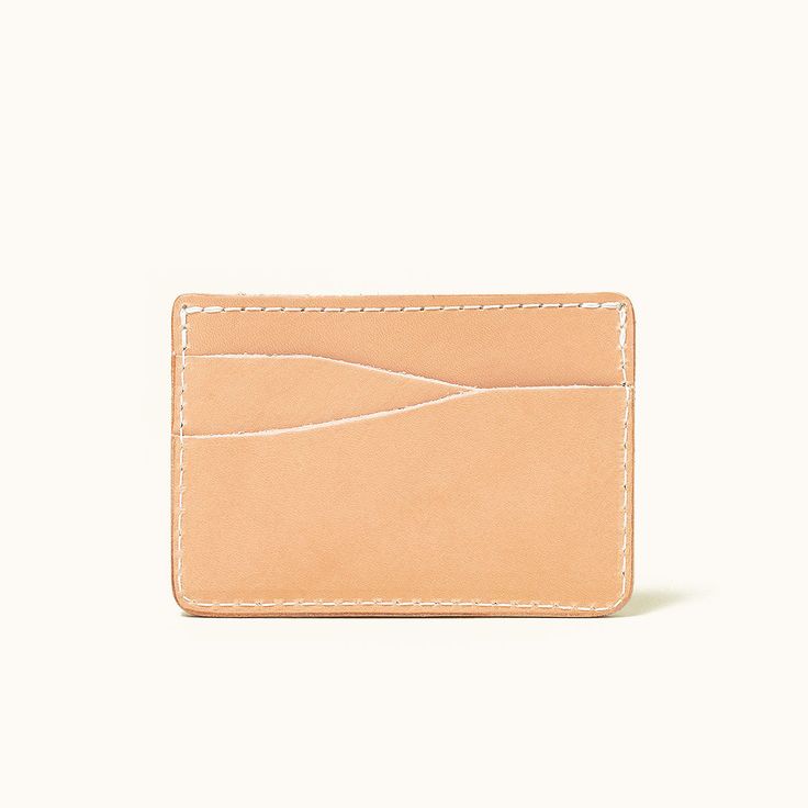 The Journeyman is a custom leather cardholder ideal for those looking for a front pocket configuration. Handcrafted in Minnesota from natural Tooling leather, the Journeyman features 4 card slots and one central pocket, making it an ideal choice for organizing cards and keeping them easily accessible on the go. Beige Leather Rectangular Card Holder, Rectangular Beige Leather Card Holder, Beige Rectangular Trifold Wallet With Card Slots, Beige Leather Card Holder With Card Slots, Leather Card Holder With Flat Pocket For Everyday Use, Beige Card Holder With Interior Slots, Beige Leather Wallet With Card Slots, Beige Card Holder With Interior Slots For Daily Use, Everyday Use Beige Card Holder With Interior Slots