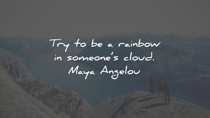 two people standing on top of a mountain with the words try to be a rainbow in someone's cloud