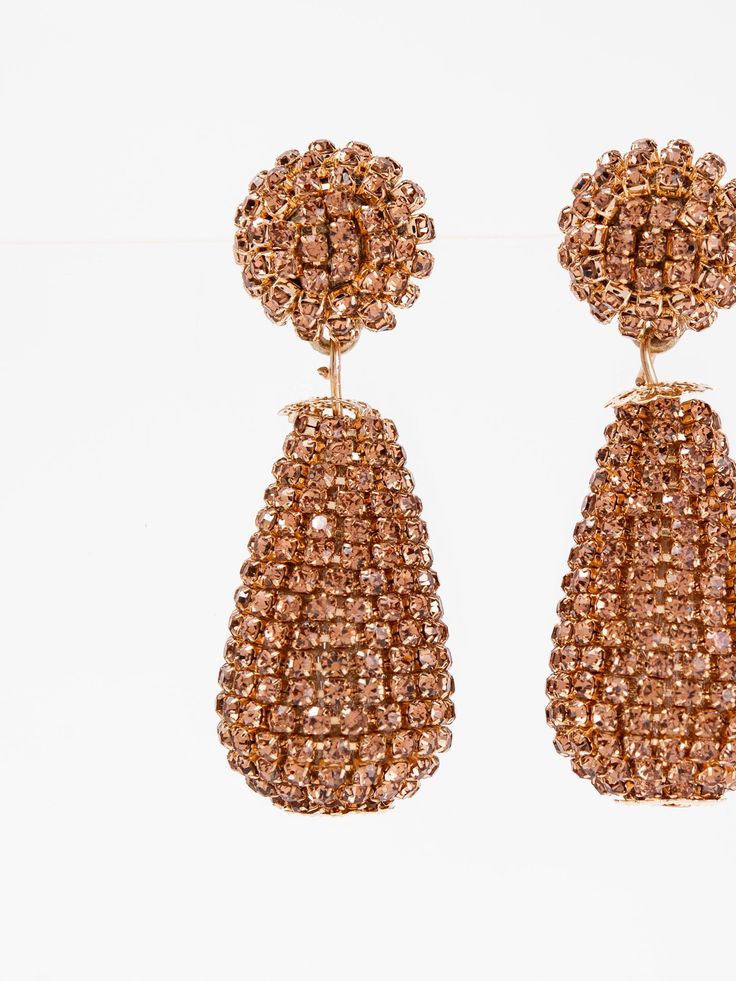 Expertly crafted, the Mila Drop Rhinestone Earrings add a touch of elegance to any outfit. With a delicate drop design and sparkling rhinestones, these earrings are perfect for any occasion. Their timeless beauty and subtle shine make them the perfect accessory for any fashion-forward individual. SizeH: 2.15"W: 0.75" QualityMade with quality materials for endurance. ImportedEY12699 Evening Teardrop Chandelier Earrings With Sparkling Stones, Glamorous Crystal Embellished Earrings For Formal Occasions, Glamorous Crystal Embellished Formal Earrings, Elegant Crystal Teardrop Earrings With Rhinestones, Evening Teardrop Earrings With Rhinestones, Evening Crystal Clip-on Earrings, Dazzling Rhinestone Crystal Earrings, Glamorous Crystal Clip-on Earrings For Formal Events, Crystal Diamond Drop Earrings For Party