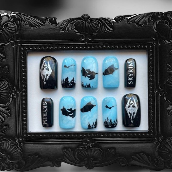 "Skyrim Nightscape" Reusable Gel Extensions Step into the enchanting world of Skyrim with this one-of-a-kind nail set inspired by the beloved fantasy game! Each nail is hand-painted with detailed dragons, misty forests, and Skyrim emblems for all the gamers and fantasy lovers out there. Reusable & Handmade: These press-on nails are designed for multiple wears, letting you bring the Skyrim magic to life again and again. Perfect for cosplays, gaming conventions, or just adding a mystical tou... Skyrim Soul Gem, Skyrim Nail Art, Skyrim Nails, Skyrim Magic, Gel Extensions, Misty Forest, Fantasy Lovers, Fantasy Games, Skyrim