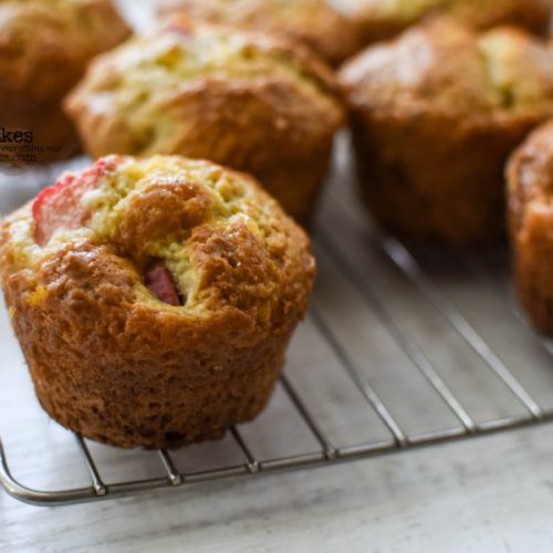 several muffins cooling on a wire rack