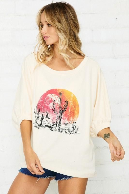 Add some desert vibes to your summer collection with this front screen print French-terry pullover with half sleeve, featured in an oversized fit. -Color: Cream -Lightweight French-terry fabric -Banded cuff and neckline -Raw edge and rounded shirttail hemline -Oversized fit -Content: 85% Cotton 15% Polyester -Hand wash/ Line dry -Made in the USA -Model is wearing a size Small Casual 3/4 Sleeve Summer T-shirt, Summer Cotton Sweatshirt With Short Sleeves, Summer Short Sleeve Relaxed Fit Sweatshirt, Relaxed Fit Short Sleeve Sweatshirt For Summer, Trendy Summer Sweatshirt With Screen Print, Summer Casual Sweatshirt For Loungewear, Casual Printed Tops With 3/4 Sleeve, Casual Summer Loungewear Sweatshirt, Casual Printed Relaxed Fit Sweatshirt