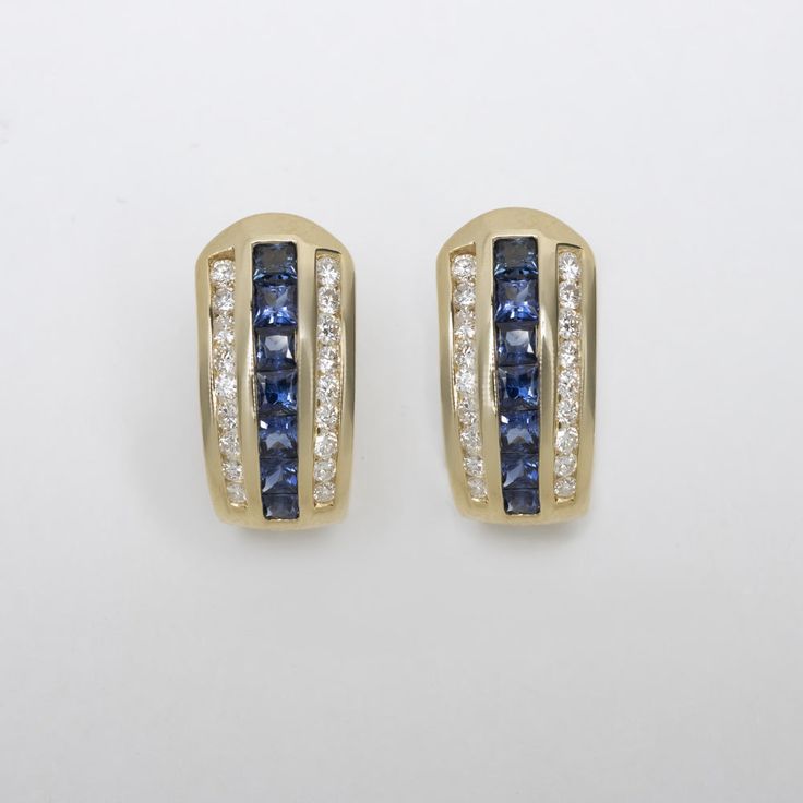 Why we love it:These vintage huggie earrings boast rich color and vibrant sparkle. The rich blue sapphires pair perfectly with the yellow gold, and the diamonds stand out brilliantly.Highlights:- Estate piece- 1.50ct of rich blue natural sapphires- 0.60ct bright white and eye clean G-H VS1-SI1 diamonds- Buttery 14k yellow goldDimensions:18.7 x 9.4mm Luxury Channel Set Diamond Huggie Earrings, Yellow Gold Round Huggie Earrings Channel Set, Yellow Gold Channel Set Huggie Earrings, Luxury Sapphire Yellow Gold Earrings, Luxury 14k Gold Diamond-cut Huggie Earrings, Sapphire Side Stones, Diamond Huggie Earrings, Huggie Earrings, Marquise Diamond