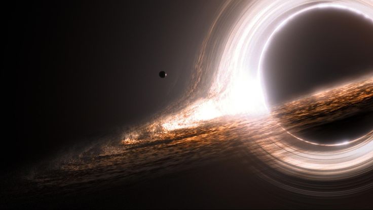 an artist's impression of a black hole in space