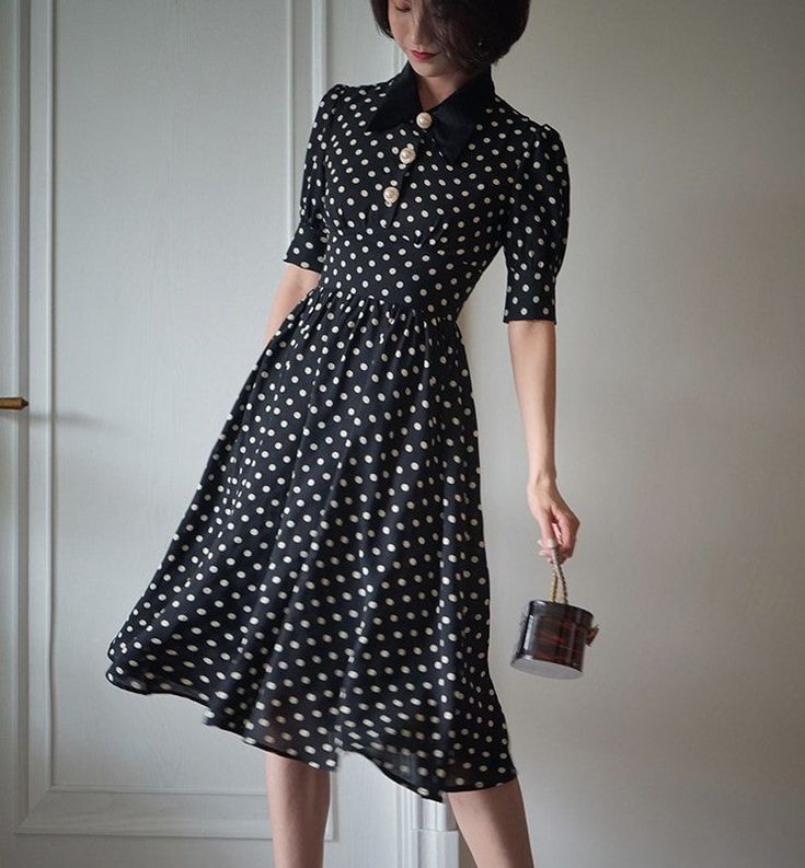 A classic polka dot dress full of elegance. This item has a noble atmosphere from the good old days, with attention to detail in the decoration. The high waist makes it look stylish, and the moderate length gives it a neat and elegant look. 
 
 
 
 
 
 
 
 
 
 Color 
 
 Black collar 
 White collar 
 
 
 Size 
 
 
 XS size 
 
 Length: 105cm 
 Shoulder width: 34.5cm 
 Bust: 80cm 
 Waist: 62cm 
 
 
 S size 
 
 Length: 109cm 
 Shoulder width: 35cm 
 Bust: 84cm 
 Waist: 66cm 
 
 M size 
 
 Length: 10 Chic Vintage Short Sleeve Formal Dress, Polka Dot Short Sleeve Formal Dress, Polka Dot Short Sleeve Evening Dress, Elegant Polka Dot Dresses With Buttons, Formal Short Sleeve Polka Dot Dress, Black Chic Dresses For Vintage Style, Elegant Short Sleeve Polka Dot Midi Dress, Elegant Short Sleeve Polka Dot Dress, Elegant Tea Length Vintage Dress For Party