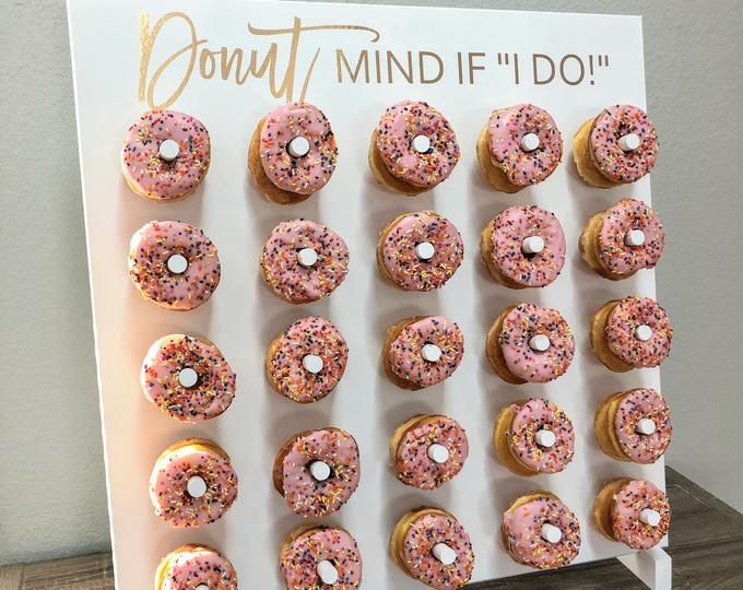 there are many donuts in the box on display for people to see and eat