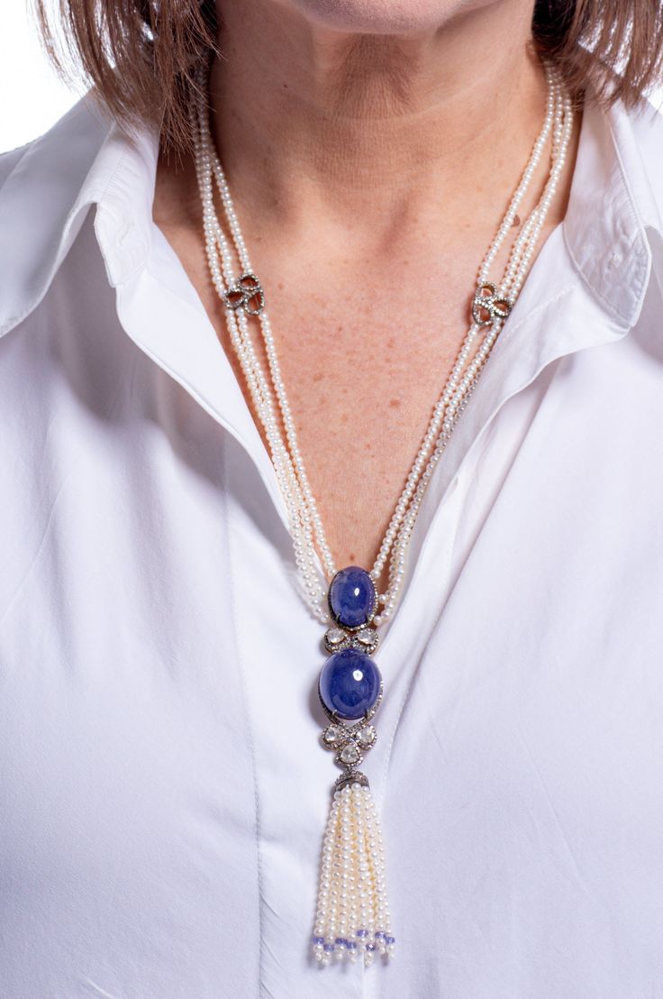 Deep blue tanzanite stones and rose cut diamonds hang on strands of seed pearls. Bohemian Sapphire Necklaces With Natural Stones, Tanzanite And Pearl Necklace, Elegant Tanzanite Beaded Necklace, Luxury Blue Baroque Pearl Necklace, Luxury Tanzanite Pendant Necklace, Tanzanite Stone, Blue Tanzanite, Hang On, Seed Pearl