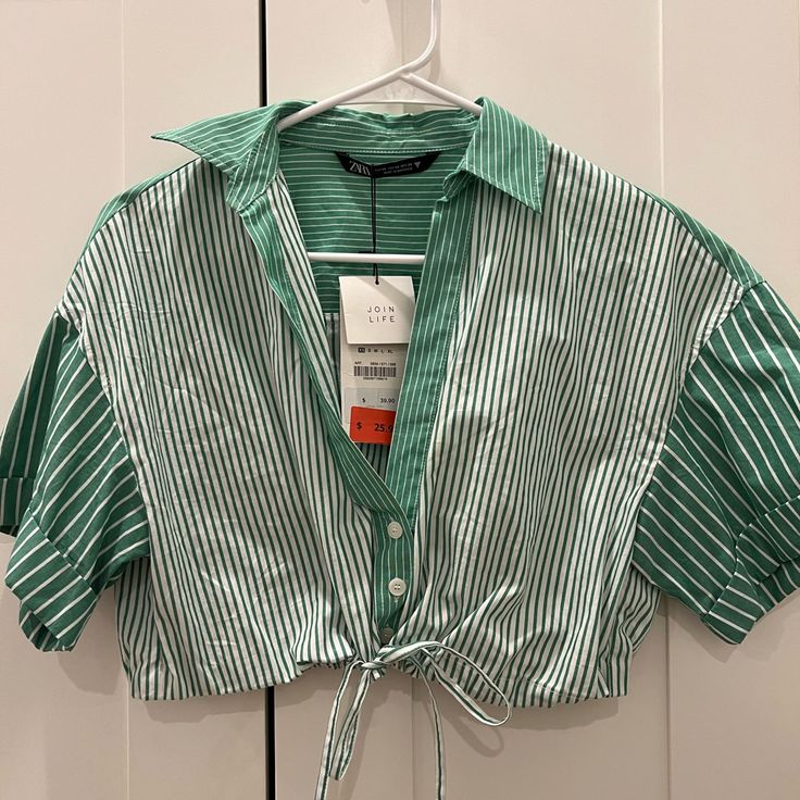 Zara Green/White Pinstripe Crop Top With Buttons And Option To Tighten Size Extra Small / Xs New With Tags - Never Worn Except When Trying On Cotton, Made In Morocco Summer Vacation Tops With Striped Collar, White Summer Tops With Vertical Stripes, Summer Striped Collar V-neck Top, Summer V-neck Top With Striped Collar, Summer V-neck Top With Contrast Stripes, Summer V-neck Tops With Striped Collar, White Top With Striped Collar For Beach, White Top With Striped Collar For The Beach, White Vertical Stripes Summer Tops