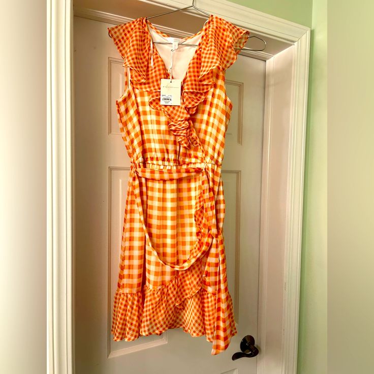 Nwt Lc Lauren Conrad April Dress Item Details 100% Polyester Short Sleeve V-Neck Mini Silhouette Checkered Pattern Ruffle Accents, Frills & Ruffles Multi Color, Orange Wedding Short Size S 31" Chest, 35" Length Orange Knee-length Mini Dress For Summer, Orange Knee-length Mini Dress For Day Out, Orange V-neck Mini Dress For Summer, Orange Knee-length Mini Dress For Spring, Summer Orange V-neck Mini Dress, Summer Knee-length Orange Mini Dress, Orange V-neck Mini Dress For Vacation, April Dress, Black Collared Dress