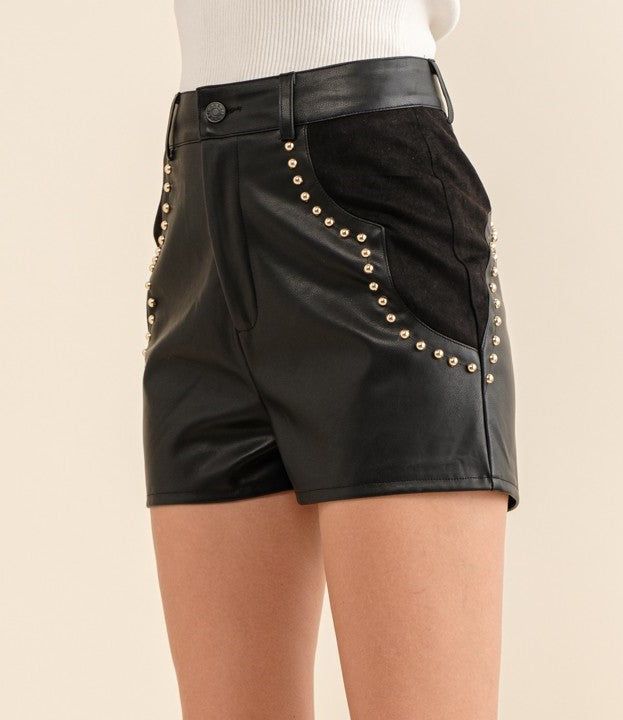 Expertly crafted using the finest materials, these faux suede & leather shorts are guaranteed to provide unbeatable softness. Perfect for a night out with the girls or a trip to Nashville, these shorts are also a great choice to level up your country western concert outfit. With stylish stud accents, you'll be sure to make a statement wherever you go. 50% PU/50% Polyester Edgy High-waisted Faux Leather Shorts, Fall High-waisted Faux Leather Shorts, Fall Faux Leather High-waisted Shorts, Faux Leather Bottoms With Built-in Shorts For Night Out, Edgy Shorts For Fall, Edgy High-waisted Shorts For Fall, Trendy High-waisted Leather Shorts, Fitted Edgy Leather Shorts, Edgy Fitted Leather Shorts