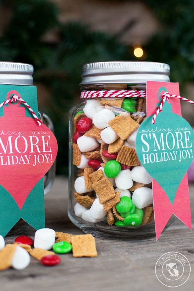 two mason jars filled with holiday treats