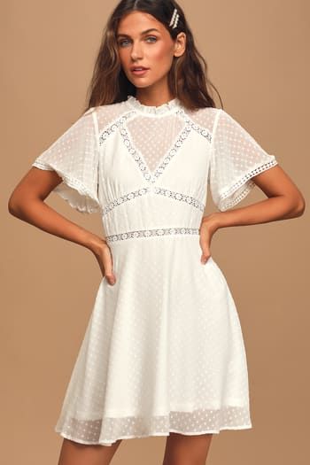 Dresses for Women | Best Women's Dresses Online Vintage Short Sleeve Dress For Date Night, Vintage Mini Dress For Day Out, Spring Dressy Dresses With Buttons, Chic Buttoned Dress For Garden Party, Fitted Button Dress For Garden Party, Chic Garden Party Dress With Buttons, Chic Mini Dress With Lace Trim And Short Sleeves, A-line Dresses With Buttons For Brunch, Short Sleeve Mini Dress With Buttons For Brunch