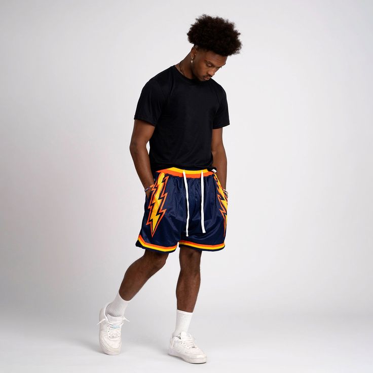 Combine your love of sports, streetwear and nostalgia by copping the Splash Bolts Basketball Shorts. Featuring a mesh construction for a comfortable and customized fit. Contrast trims keep these shorts looking straight fire and make them a stand out, on and off the court. Cop yours today!- Splash Bolts Basketball Shorts - Ultra-Comfortable, Silky Smooth Inner Lining- 5.5' Inseam- Elasticated Waistband- 100% Heavyweight Mesh Fabric- High Quality Sublimation - Premium Double-Knit Rib Leg Trim- Dee Casual Blue Athletic Shorts For Sports Events, Navy Athleisure Bottoms For Sports Events, Breathable Nylon Athletic Shorts For Streetwear, Blue Bottoms For Streetwear During Sports Season, Breathable Blue Bottoms For Streetwear, Navy Sporty Shorts For Sports Events, Sporty Navy Athletic Shorts For Sports Events, Sporty Navy Shorts For Sports Events, Casual Nylon Athletic Shorts For Sports Events