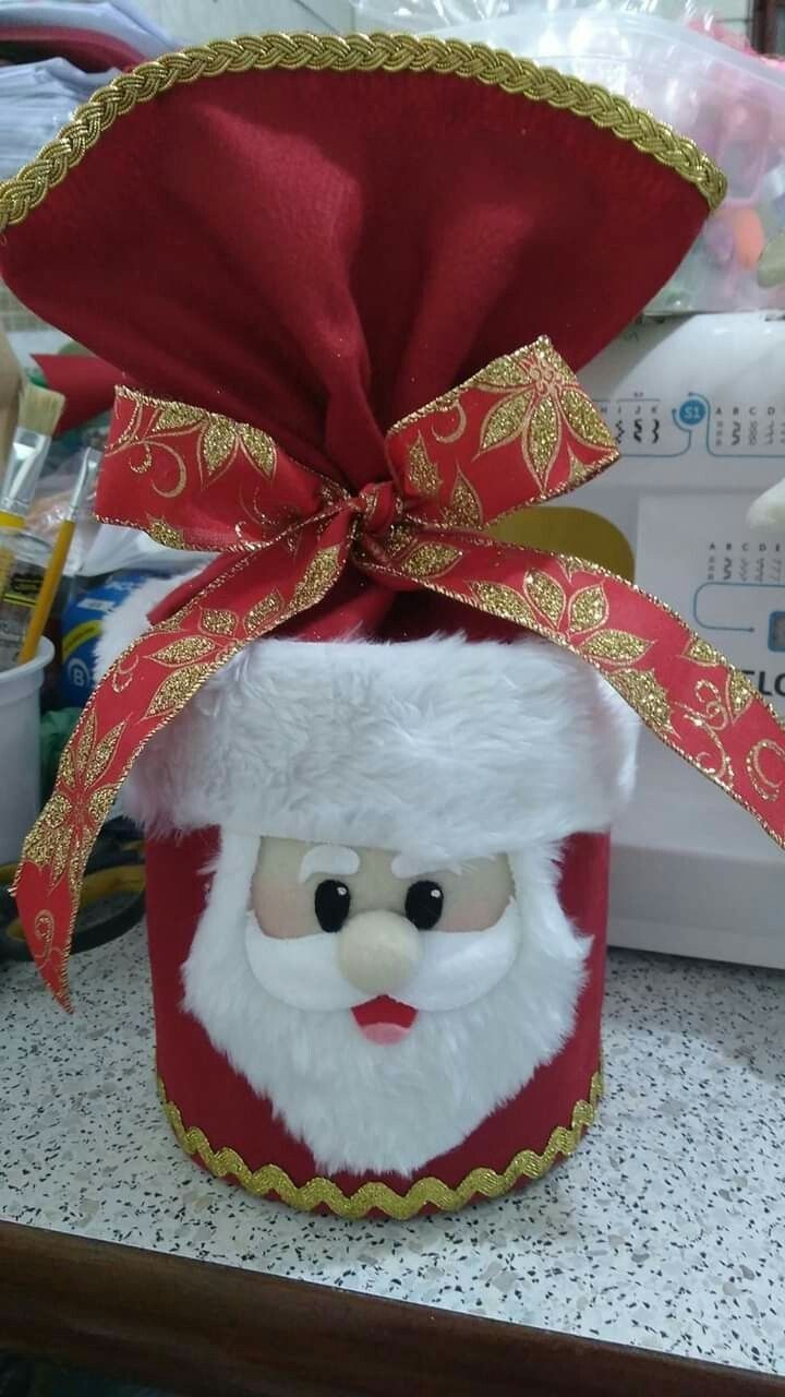 a santa claus canister sitting on top of a counter