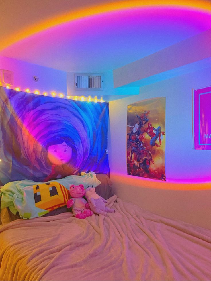 a bedroom with colorful lights on the ceiling and a bed in front of a large painting