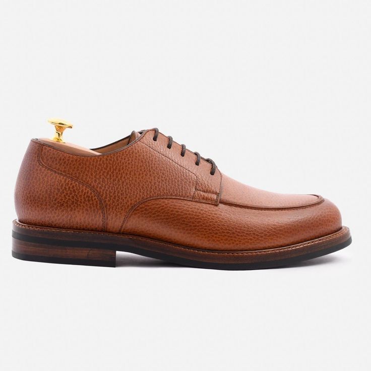 A distinctive look. Moving away from the usual cap-toe and broguing, the Anders Split-Toe Derbies in textured pebbled leather offer a profile that adapts easily to dressy outfits and casual looks. Without being flashy or loud, these shoes have a unique character which helps you showcase your own sense of style. This product is made from full-grain calfskin leather sourced from a Gold-Rated tannery based in Arzignano, Italy. Being the highest level of recognition awarded by the Leather Working Gr Brown Leather Shoes With Textured Sole For Semi-formal, Brown Leather Shoes With Textured Sole For Semi-formal Occasions, Brown Leather Shoes With Textured Sole, Timeless Brown Leather Shoes With Textured Sole, Brown Leather Semi-formal Shoes With Textured Sole, Masculine Oxfords With Textured Sole, Semi-formal Leather Shoes With Textured Sole And Plain Toe, Semi-formal Brown Leather Shoes With Textured Sole, Leather Derby Shoes With Textured Sole For Business