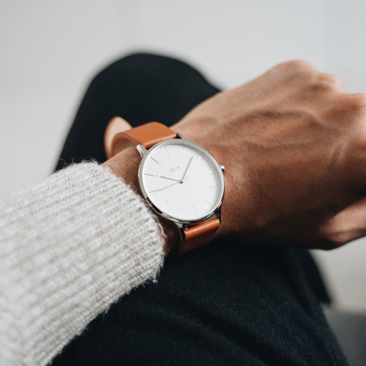 The Core Collection. Our premium line of watches with a minimalist and timeless look. Designed in the UK and perfect for everyday use. This is our silver on brown leather. The stainless steel case has a silver chrome finish. The hands and numbers have a silver reflective finish. Stainless steel casing Mineral glass Genuine leather strap Japanese movement 40mm diameter watch face 18mm width strap 3 ATM splash resistant We don't add weight to our watch boxes like other brands do. Our boxes are mad Silver Timeless Watch For Everyday, Modern Brown Analog Watch, Modern Brown Analog Display Watch, Minimalist Brown Watch As A Gift, Minimalist Brown Watch As Gift, Modern Brown Watch With Metal Dial, Classic Leather Watches For Everyday, Classic Everyday Leather Watch, Minimalist Leather Watches With Subdials