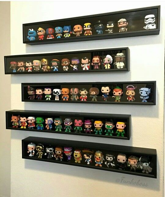 the shelves are filled with different types of pop culture figurines