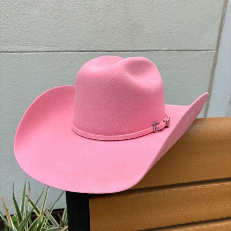 Serratelli Hat Company Made in the USA Brim: 4.25 inches Long Oval Color: Pink 2X Wool Satin Lined Leather Sweatband Western Pink Hat With Curved Brim, Western Style Pink Hat With Curved Brim, Fitted Brimmed Hat For Rodeo, Fitted Wide Brim Hats For Rodeo, Western Hat With Curved Brim, Western Hat With Flat Brim, Pink Curved Brim Hat For Rodeo, Fitted Solid Color Hat Bands For Rodeo, Fitted Western Brimmed Hat