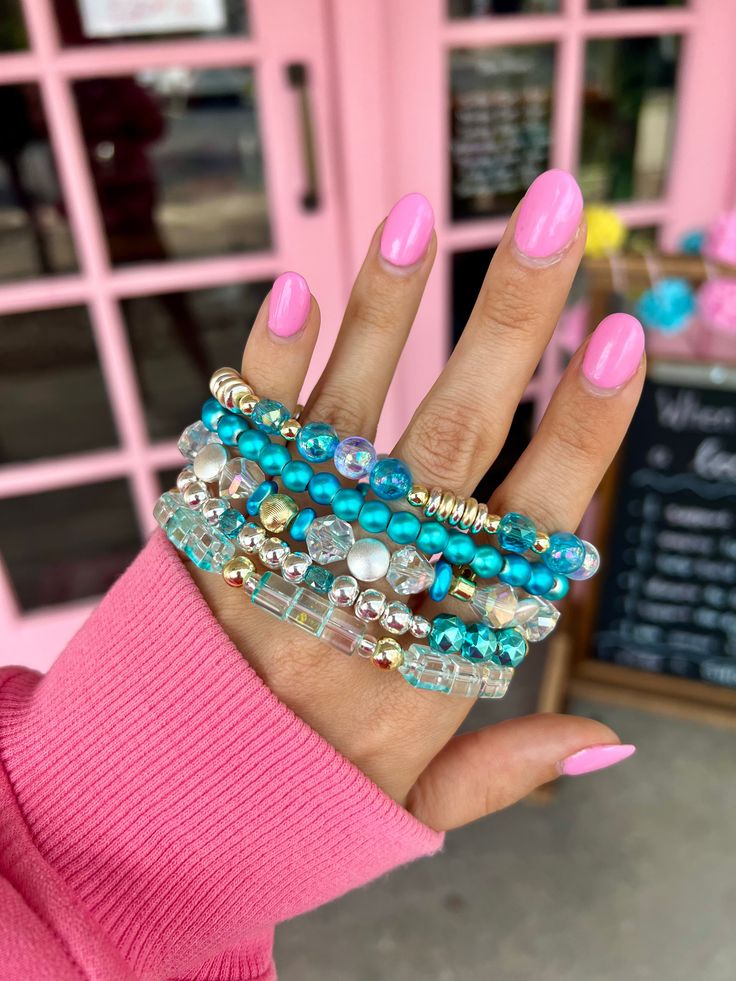 Add a pop of color with our vibrant blue Fairy Stack Bracelet! Perfect for a playful touch to any outfit. Stack 'em up and make a statement. Choose to purchase the full stack or an individual bracelet. 1 bracelet for $9 or 5 for $38 - Discount Applied at Checkout Lead & Nickel Free Bracelets are 'one size fits most' and are designed to fit wrists up to 7.5" comfortably. Please be aware that due to the unique and handmade nature of each product, colors, shapes, and bead sizes may vary slightly fr Stretch Beaded Bracelets Diy, Teal Bracelet, Stack Bracelet, Bead Sizes, Blue Fairy, Bracelets Diy, Bracelet Diy, Free Bracelet, Floral Outfit