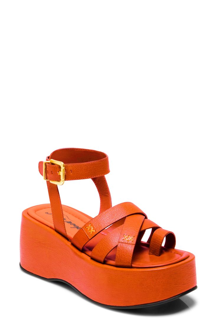 A toe loop detail adds a fun flourish to an ankle-strap sandal set on a lofty platform sole. 2 3/4" heel; 1 1/2" platform Adjustable ankle strap with buckle closure Leather upper and lining/synthetic sole Imported Trendy Wedge Sandals With Ankle Strap, Trendy Wedge Sandals With Ankle Strap And Buckle, Trendy Wedge Sandals With Ankle Strap And Buckle Closure, Trendy Ankle Strap Wedge Sandals With Heel Loop, Trendy Ankle Strap Wedge Sandals With Buckle Closure, Spring T-strap Sandals With Tang Buckle, Spring T-strap Wedge Sandals With Buckle Closure, Spring Platform Sandals With Toe Loop, Trendy Platform Sandals With Single Toe Strap