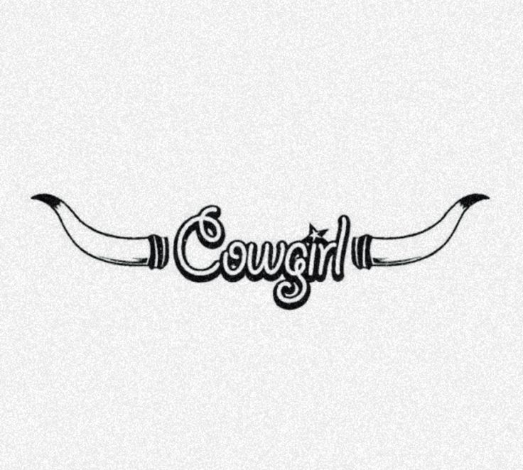 the word cowgirl written in black ink on a white paper with an animal's tail