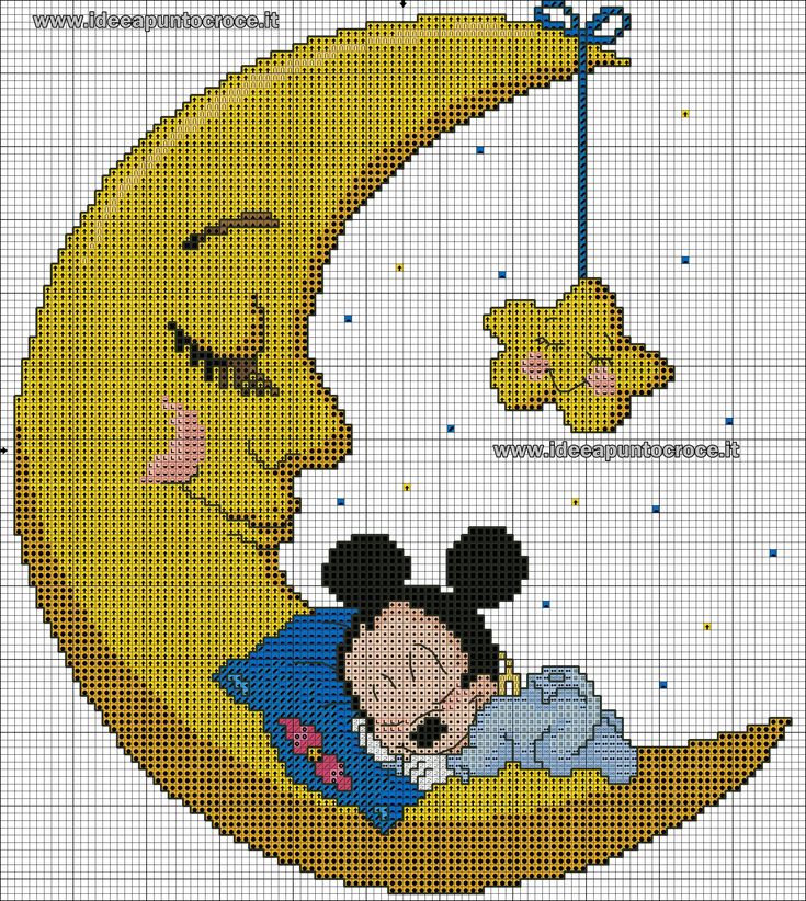 a cross stitch pattern with mickey and minnie on the moon